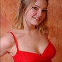 Danielle looks super cute and innocent in her red babydoll and black tight panties