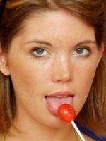 Diddy shows off her amazing oral skills with a lollipop as she strips out of her bikini