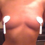 Sexy camgirl Ashley loves to tease with her new tassles covering her perfect dark nipples