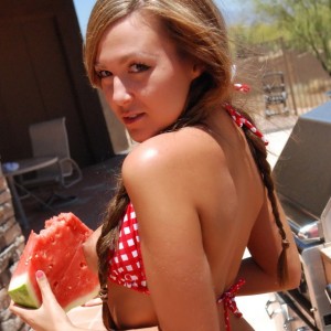 Country girl Craving Carmen makes a mess with her juicy watermelon in a tiny checkered string bikini and tiny jean shorts